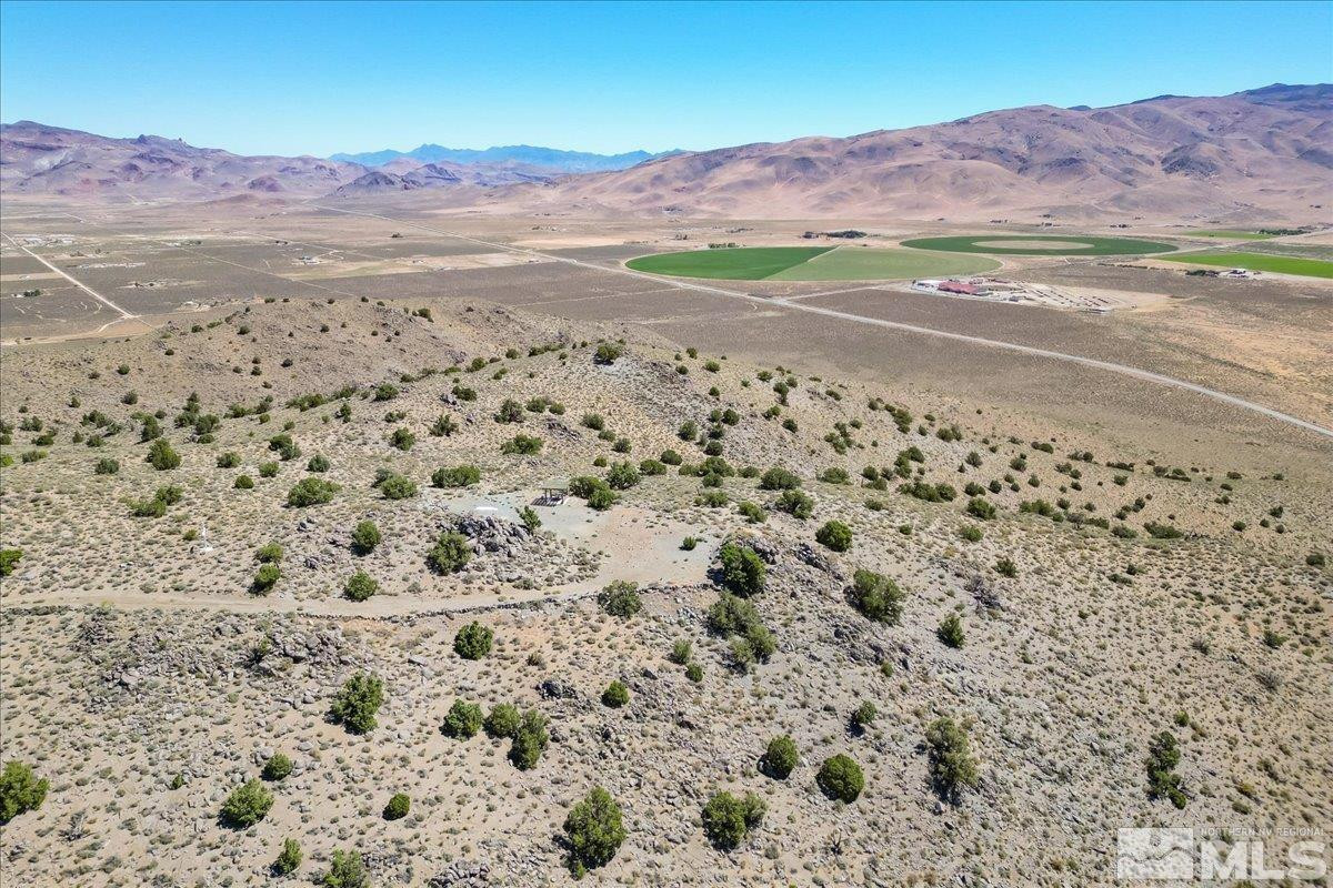 0 Pyramid Way, Unit LEFT TURN OFF OF PYRAMID HIGHWAY SIGN ON ROAD Reno, NV 89510 - Photo 15 of 26 a view of a city with mountain