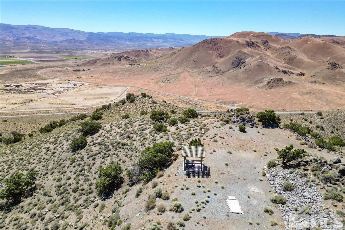 0 Pyramid Way, Unit LEFT TURN OFF OF PYRAMID HIGHWAY SIGN ON ROAD Reno, NV 89510 - Photo 17 of 26 a view of lake and mountain