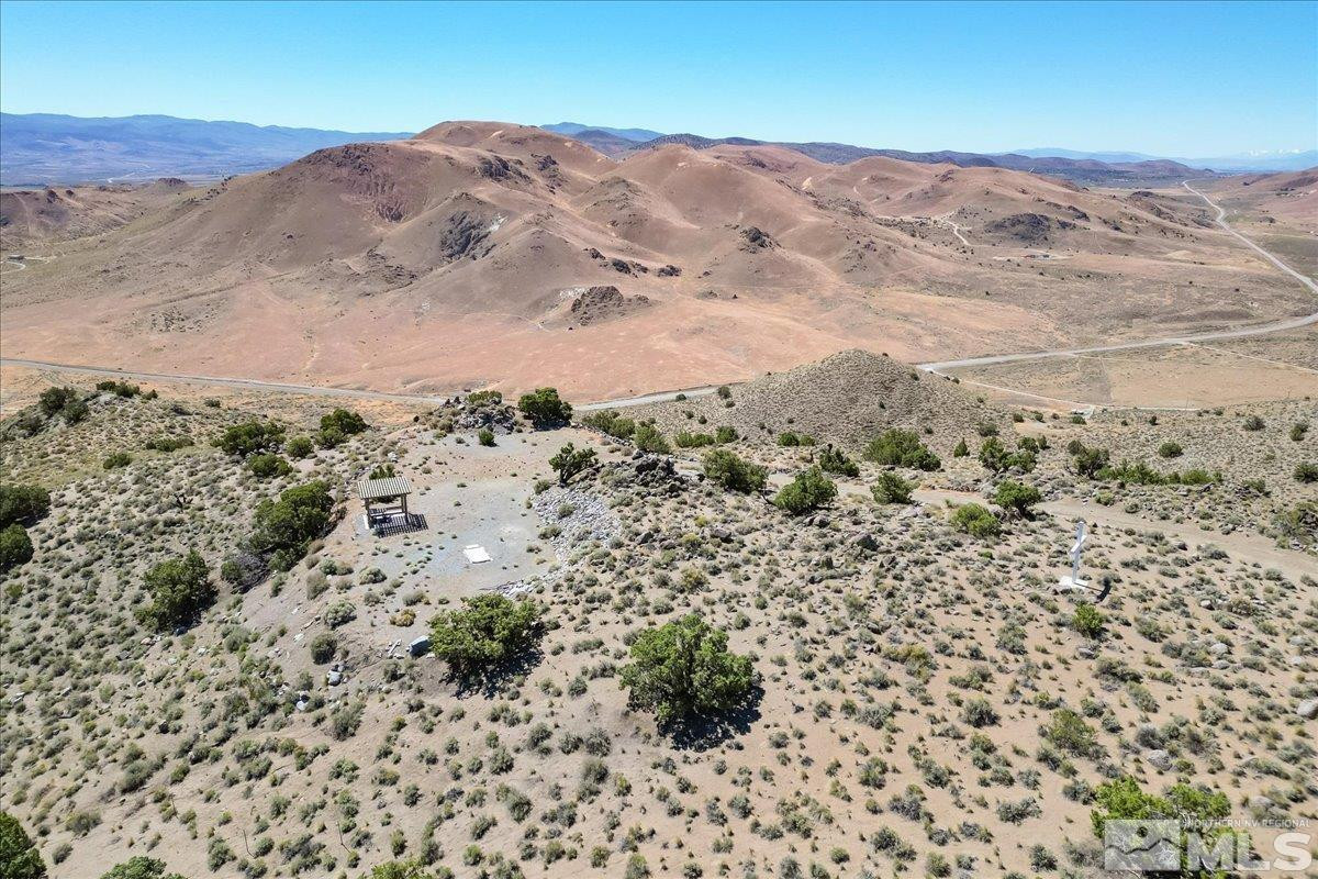 0 Pyramid Way, Unit LEFT TURN OFF OF PYRAMID HIGHWAY SIGN ON ROAD Reno, NV 89510 - Photo 18 of 26 a view of mountain view with lots of trees