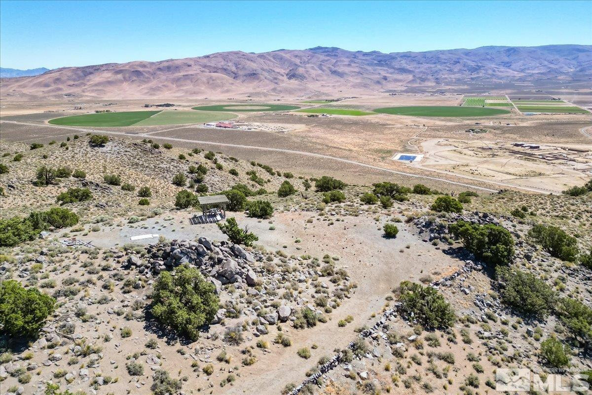 0 Pyramid Way, Unit LEFT TURN OFF OF PYRAMID HIGHWAY SIGN ON ROAD Reno, NV 89510 - Photo 19 of 26 a view of a city with an ocean beach