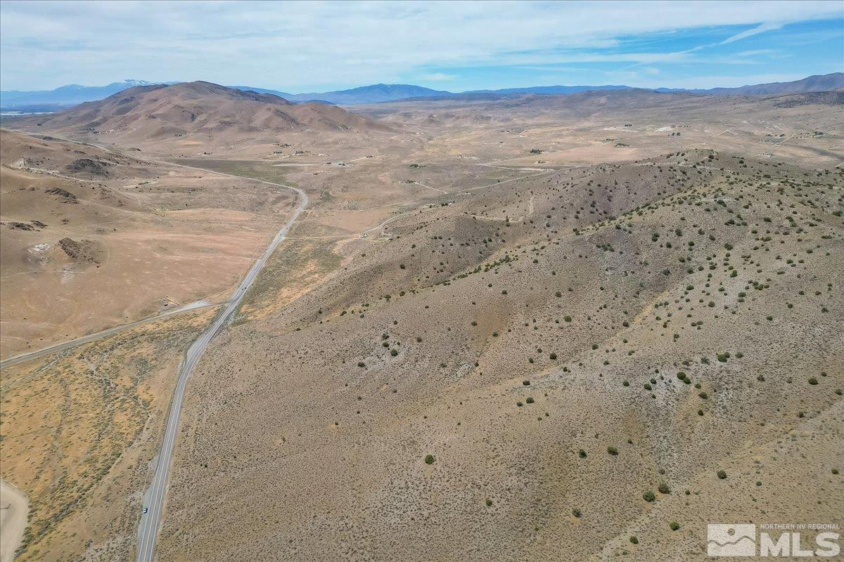 0 Pyramid Way, Unit LEFT TURN OFF OF PYRAMID HIGHWAY SIGN ON ROAD Reno, NV 89510 - Photo 21 of 26 a view of beach and small yard