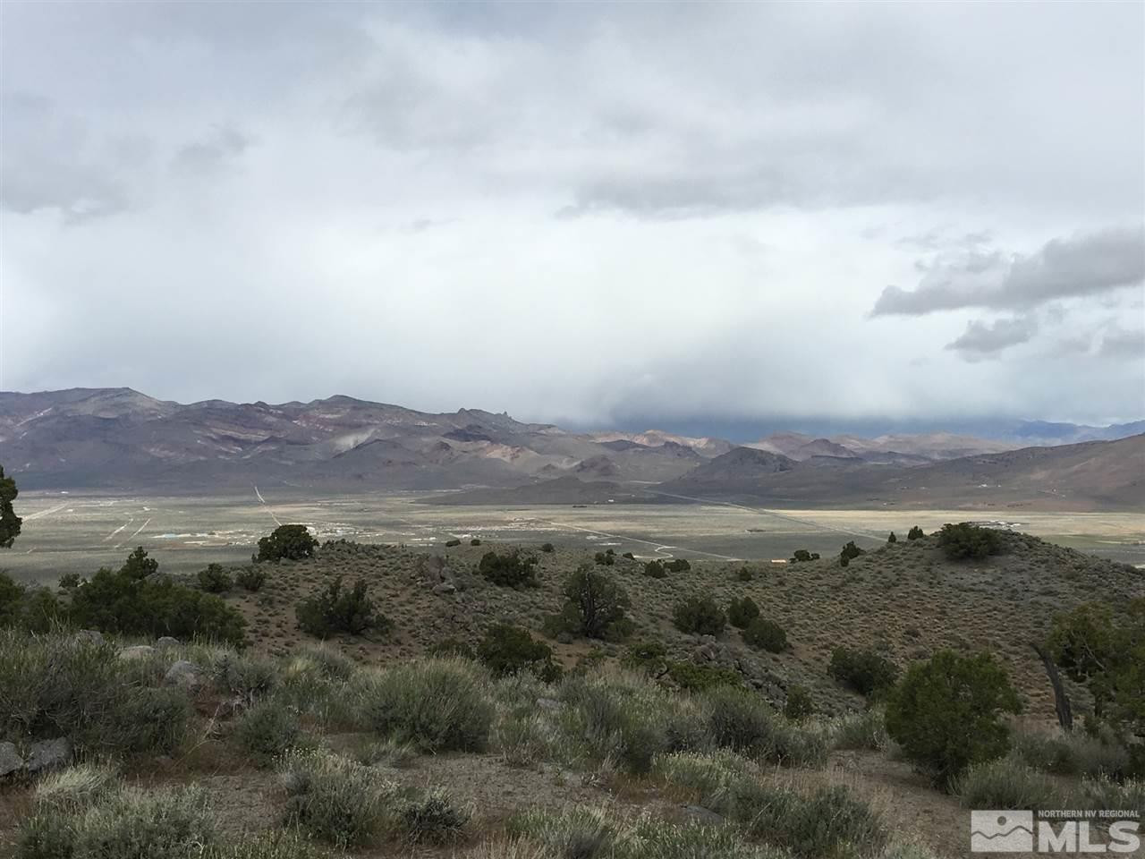 0 Pyramid Way, Unit LEFT TURN OFF OF PYRAMID HIGHWAY SIGN ON ROAD Reno, NV 89510 - Photo 25 of 26 a view of lake and mountain