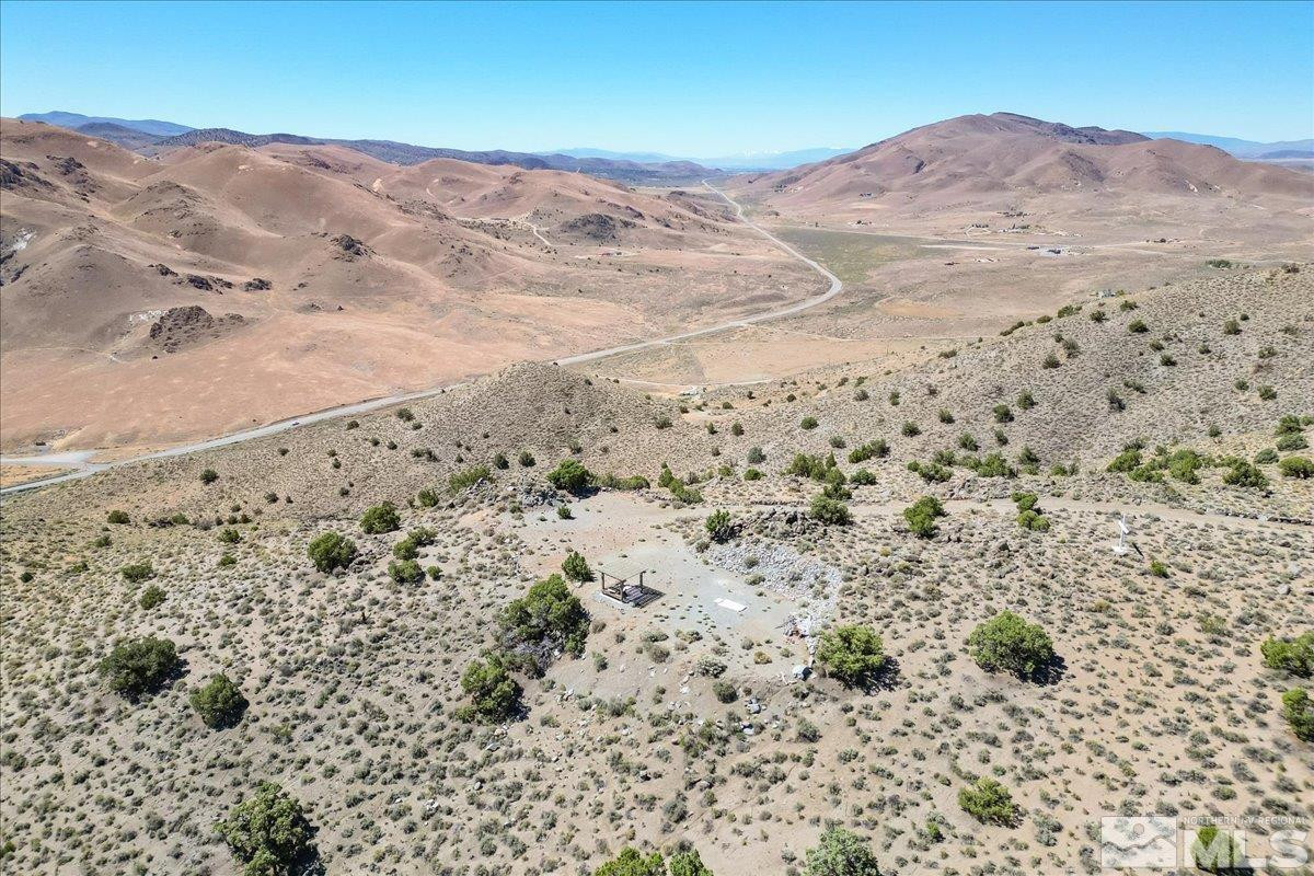 0 Pyramid Way, Unit LEFT TURN OFF OF PYRAMID HIGHWAY SIGN ON ROAD Reno, NV 89510 - Photo 9 of 26 a view of mountain view with wooden floor