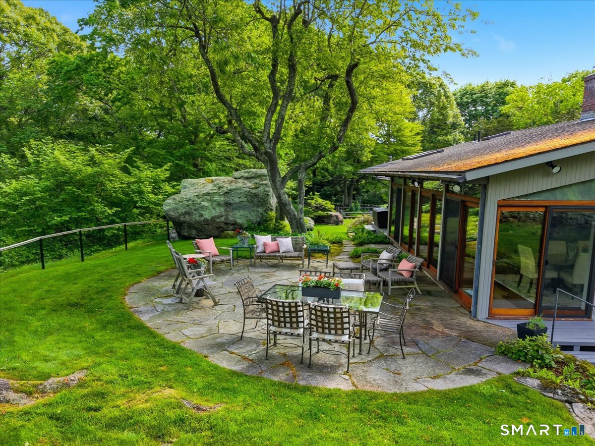 111 Tipping Rock Road Stonington, CT 06378 - Photo 11 of 40 Terrace overlooking grounds and pool