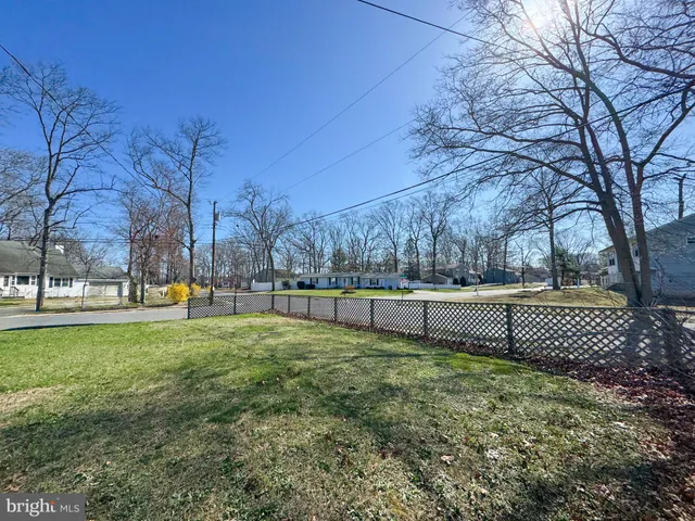 a view of swimming pool with outdoor seating