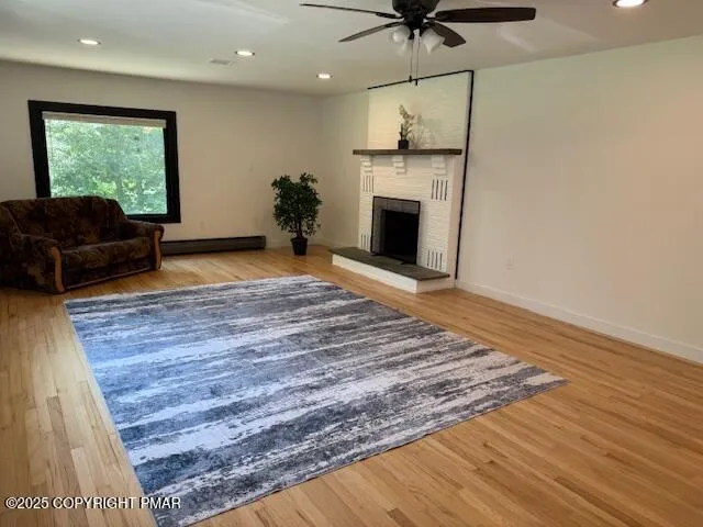 a living room with a couch and a fireplace