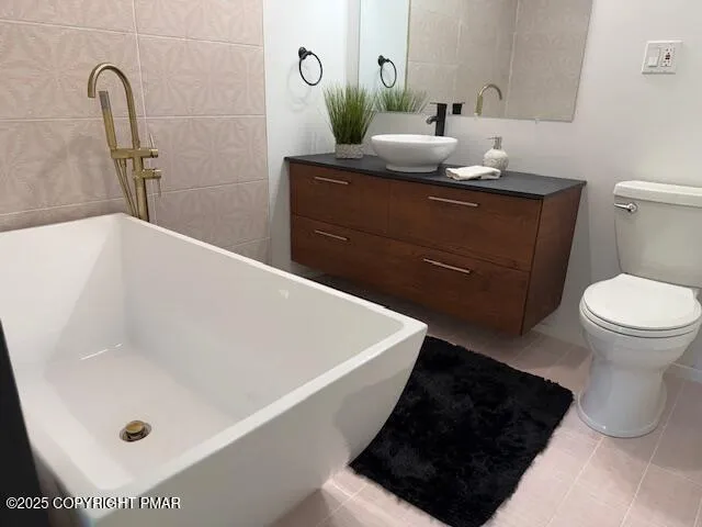 a bathroom with a sink and a toilet