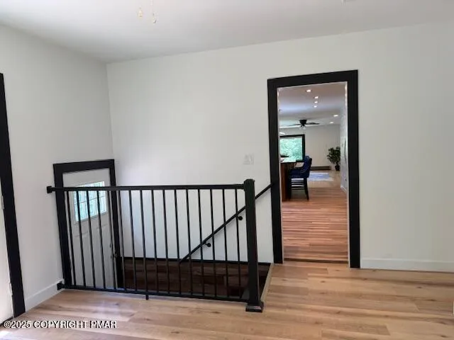 a view of entryway with wooden floor