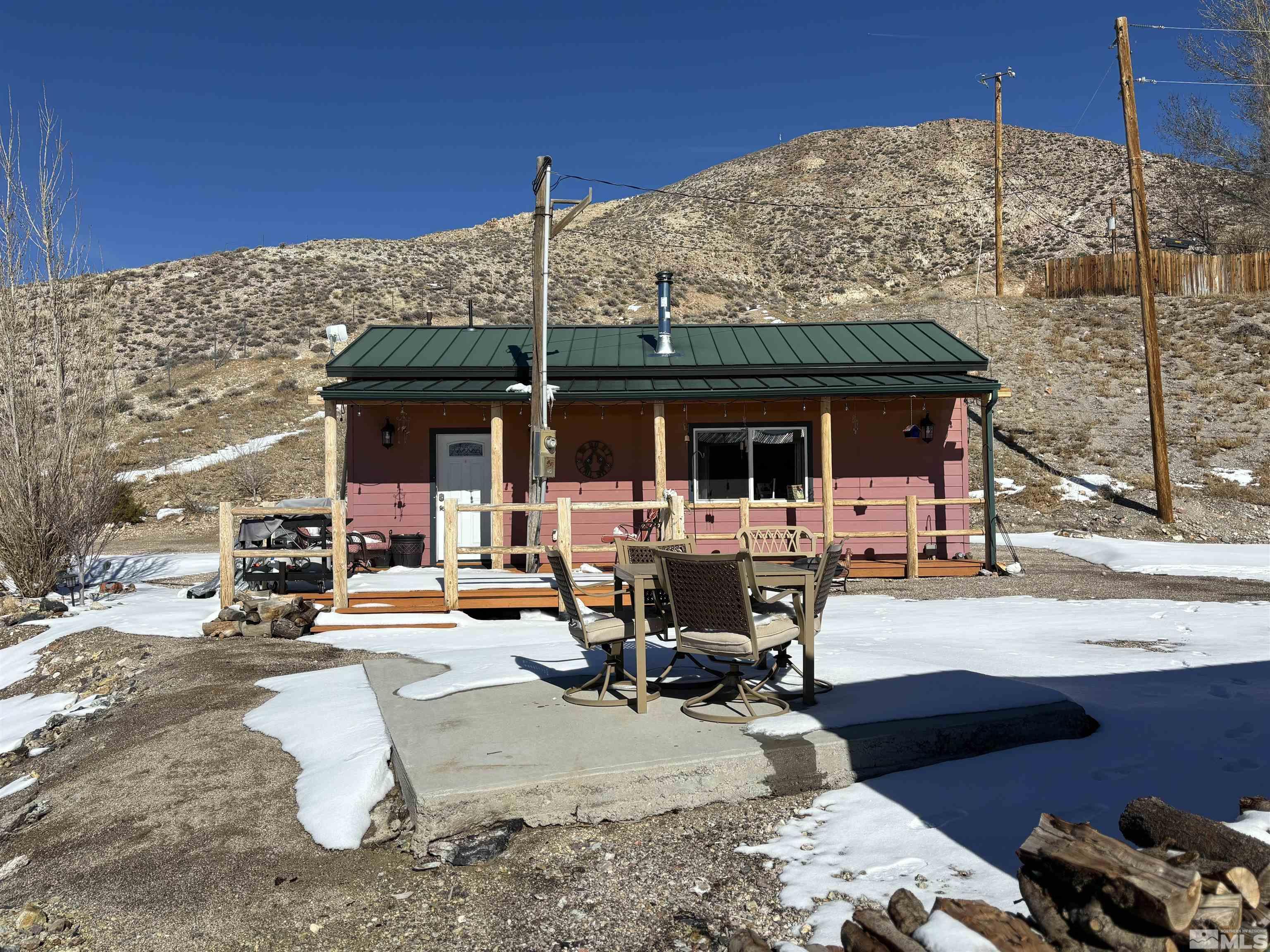 580 Silver Circle Tonopah, NV 89049 - Photo 24 of 37 a view of a backyard with sitting area