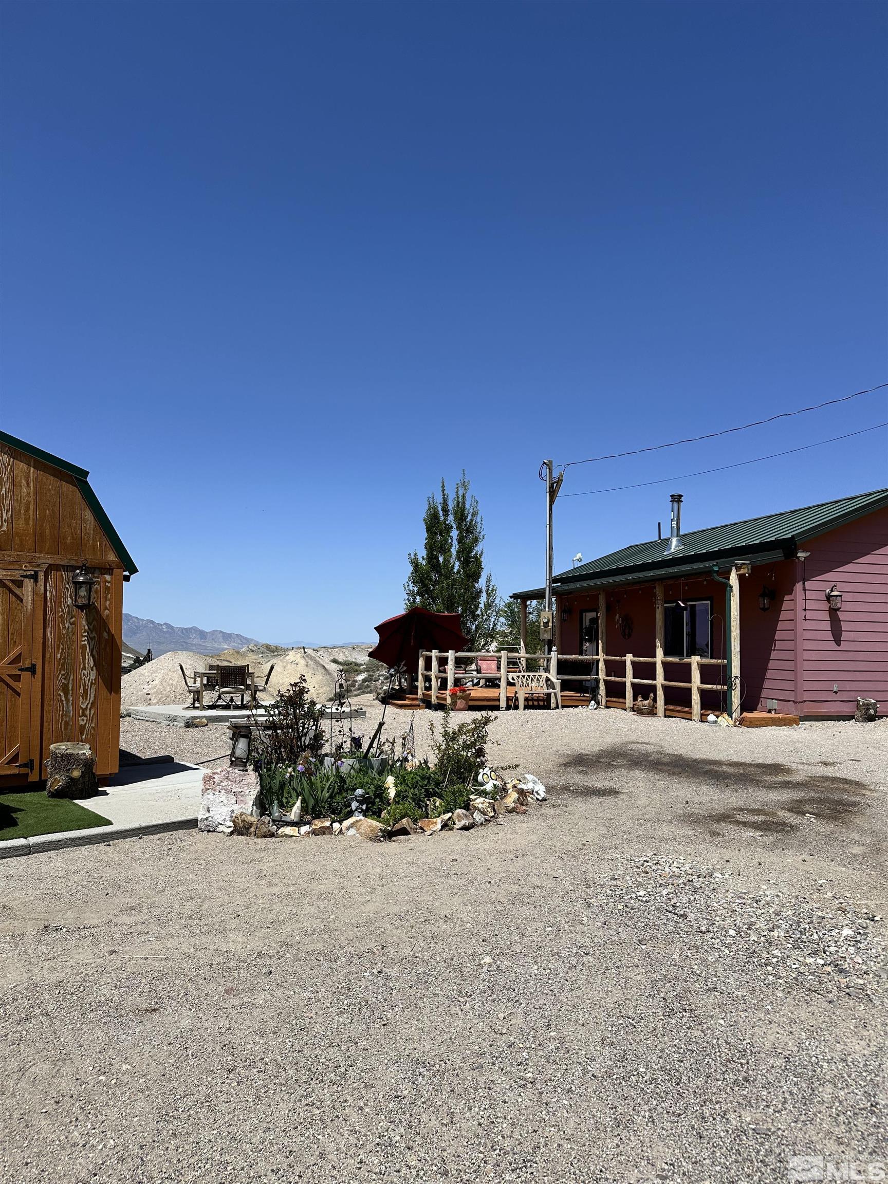 580 Silver Circle Tonopah, NV 89049 - Photo 7 of 37 a front view of a house with a yard