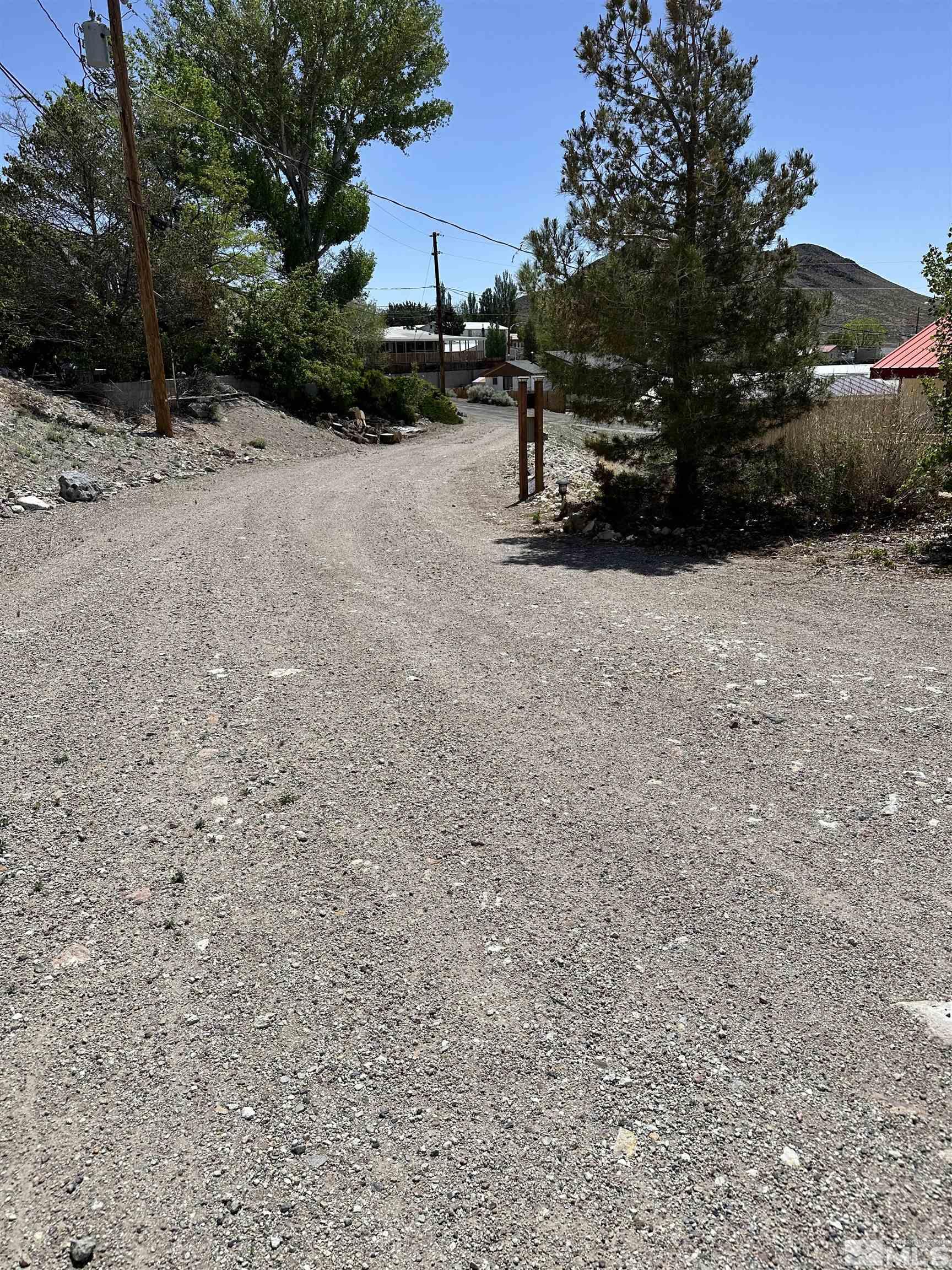 580 Silver Circle Tonopah, NV 89049 - Photo 8 of 37 a view of a backyard of a house