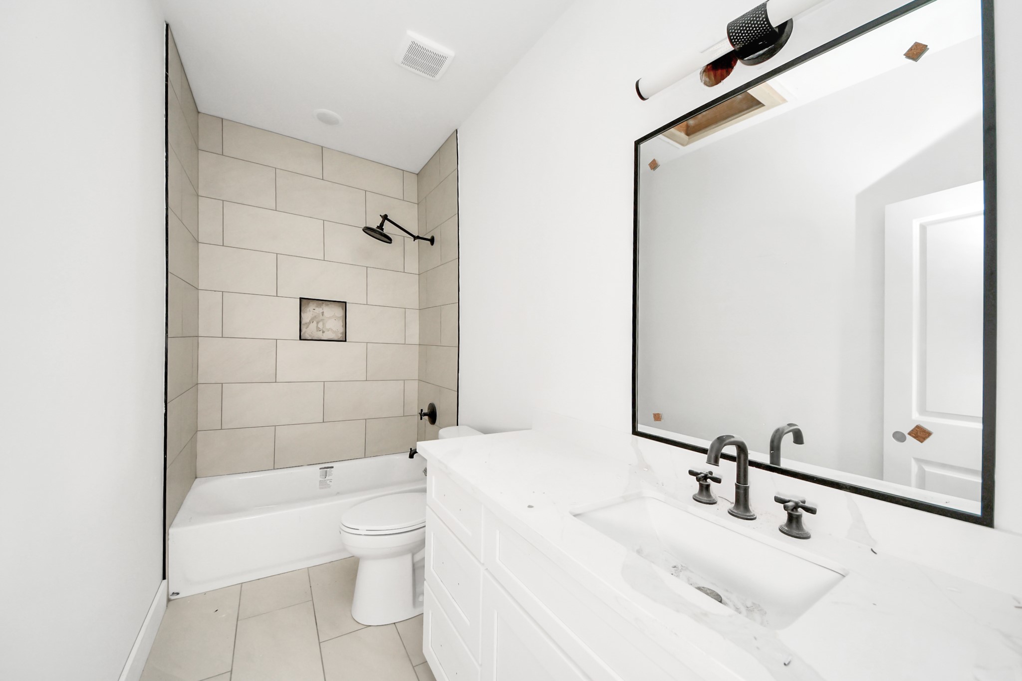 8206 Colonial Lane Houston, TX 77051 - Photo 21 of 31 a bathroom with a bathtub shower sink and toilet