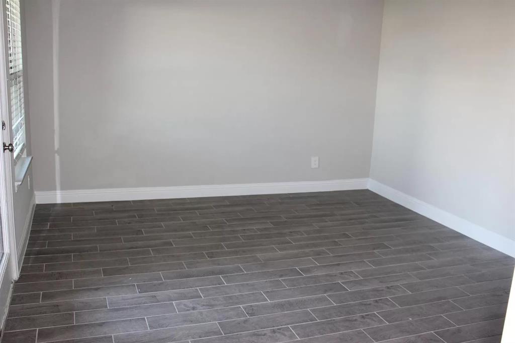 1752 Redding Street Allen, TX 75002 - Photo 18 of 24 Spare room featuring dark hardwood / wood-style floors