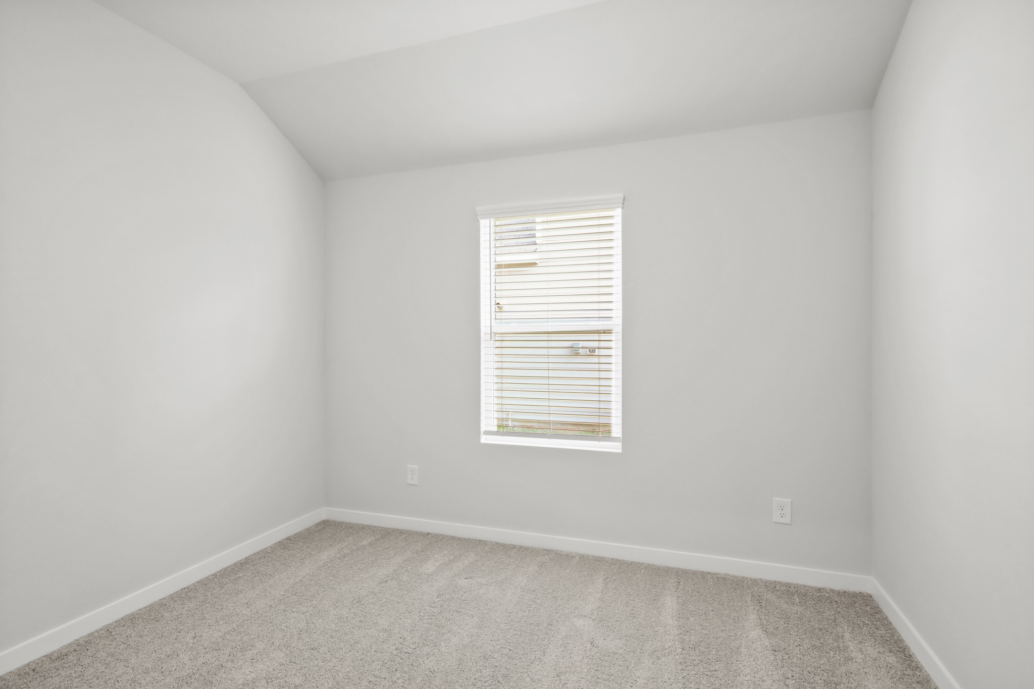 9715 Caney Bend Road Conroe, TX 77303 - Photo 12 of 24 an empty room with a window