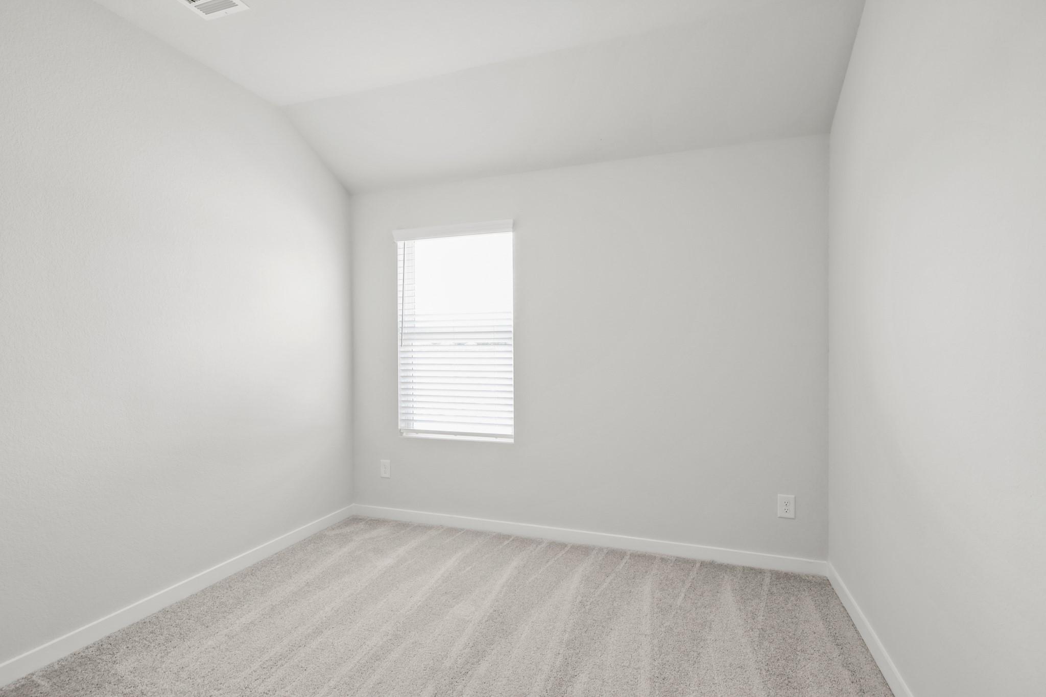 9715 Caney Bend Road Conroe, TX 77303 - Photo 14 of 24 an empty room with a window
