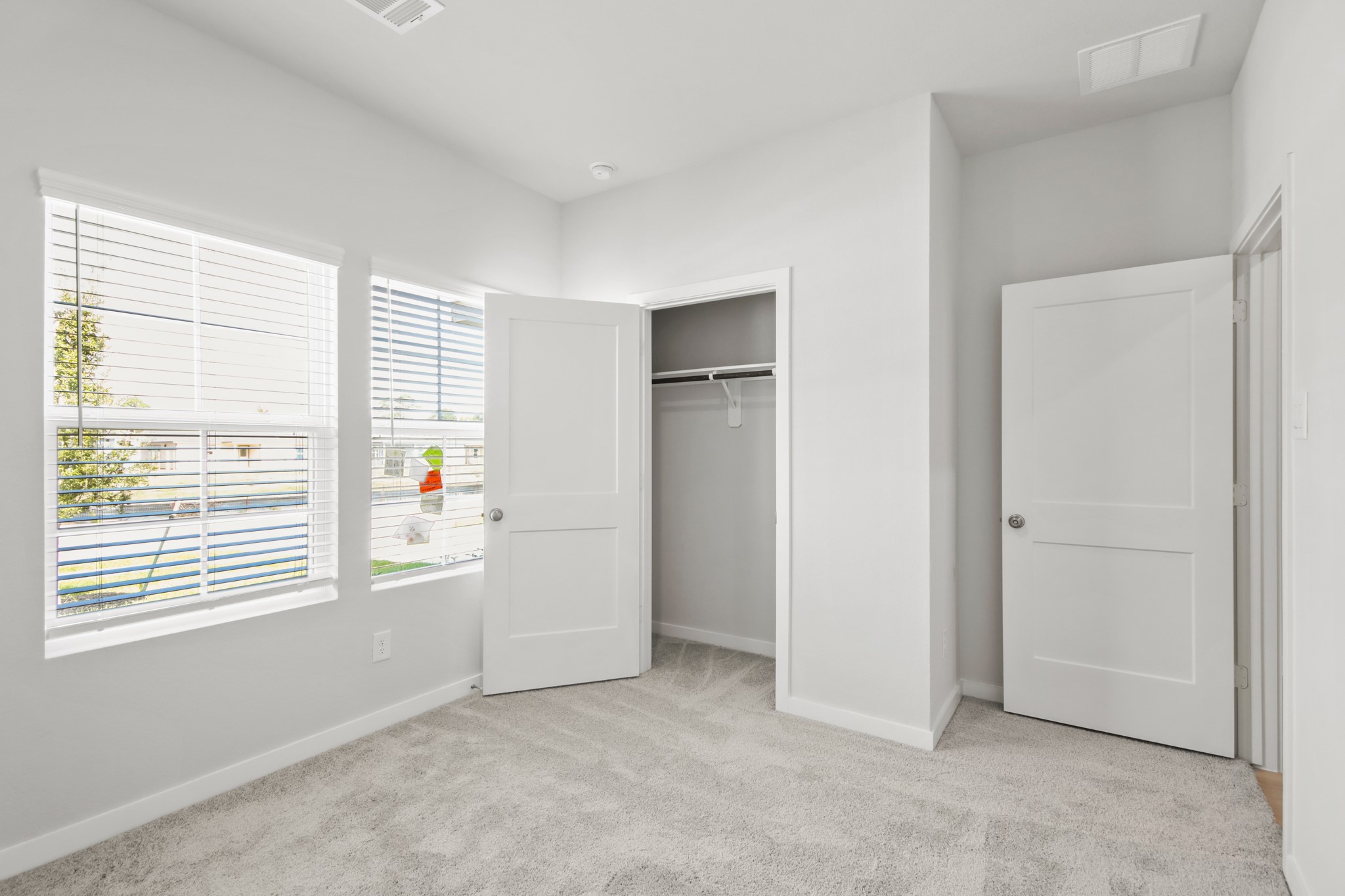 9715 Caney Bend Road Conroe, TX 77303 - Photo 15 of 24 a view of an empty room with a window