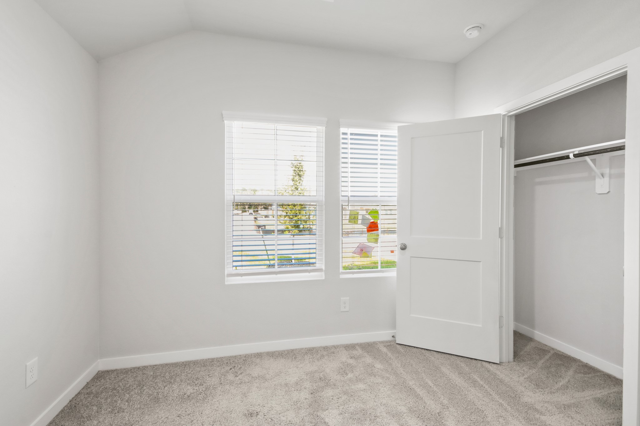 9715 Caney Bend Road Conroe, TX 77303 - Photo 16 of 24 an empty room with windows