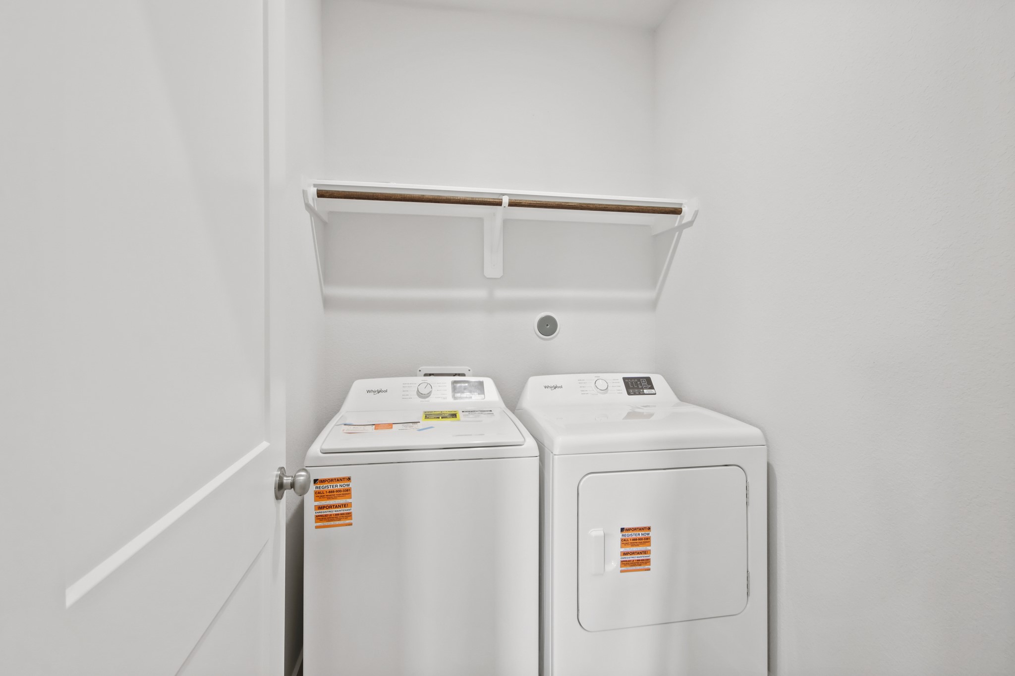 9715 Caney Bend Road Conroe, TX 77303 - Photo 18 of 24 a utility room with dryer and washer
