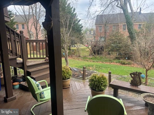 908 Walnut Wood Road Cockeysville, MD 21030 - Photo 2 of 5 a view of a porch with furniture and a yard