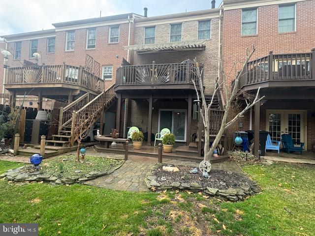 908 Walnut Wood Road Cockeysville, MD 21030 - Photo 5 of 5 a view of a house with backyard porch and sitting area