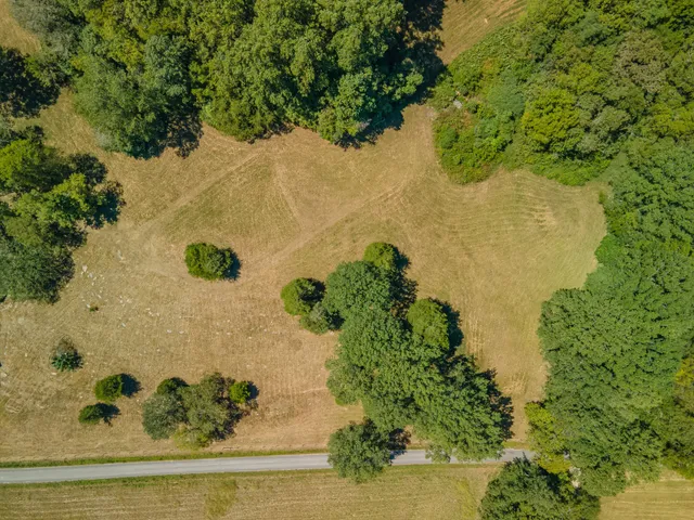 a view of a lake with a yard