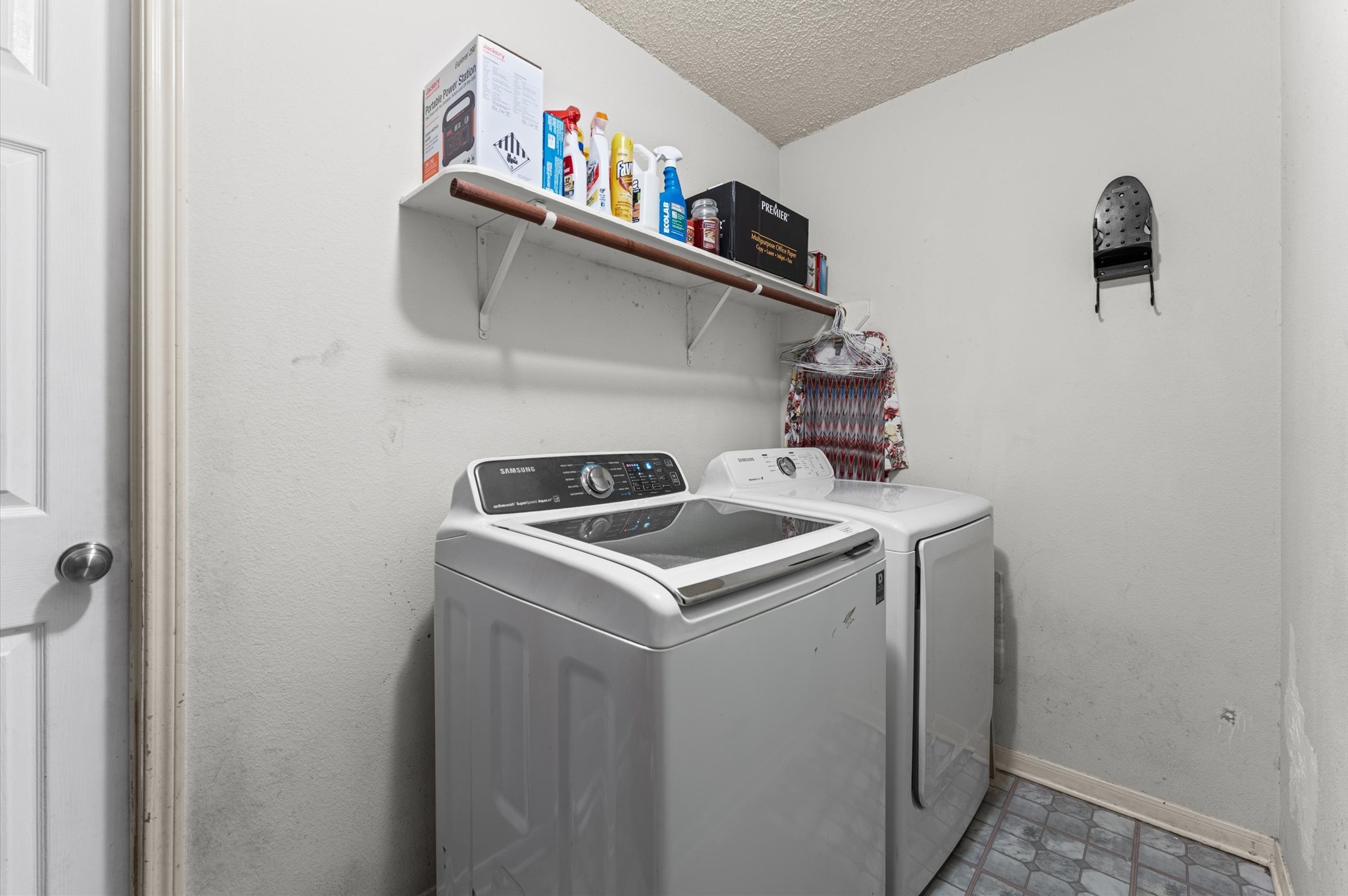 9903 Burntfork Street Houston, TX 77064 - Photo 20 of 25 Laundry room located right before you go into the garage.