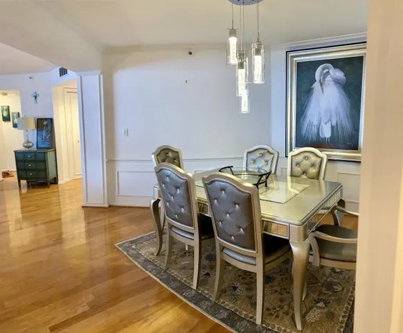 a living room with furniture fireplace and a flat screen tv