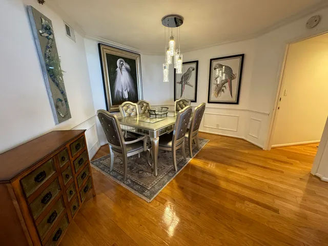 a bedroom with a bed couch and window