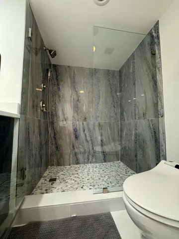 a room with a dresser and a mirror