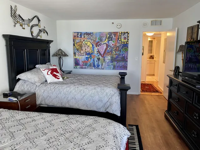 a aerial view of a house with a swimming pool