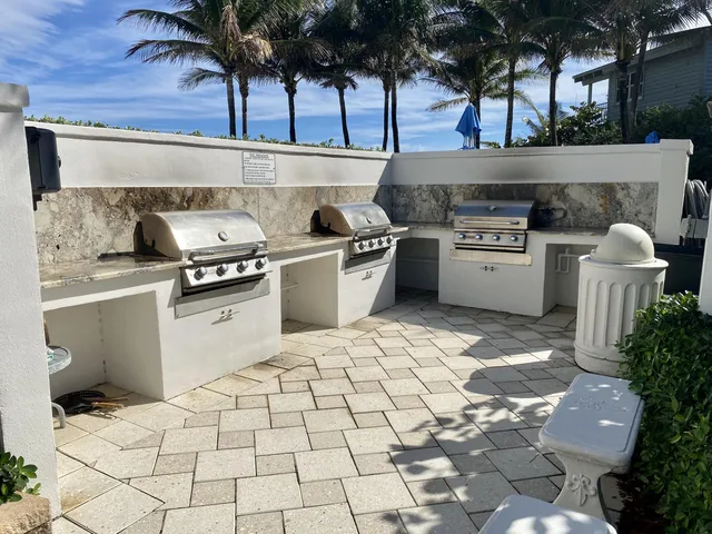 a view of a balcony with an ocean view