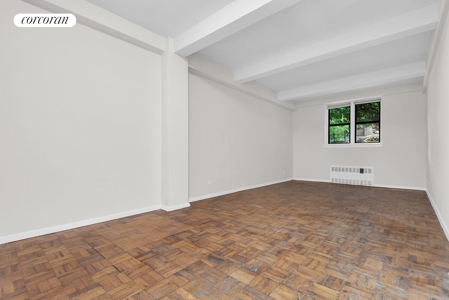 a view of a room with a window