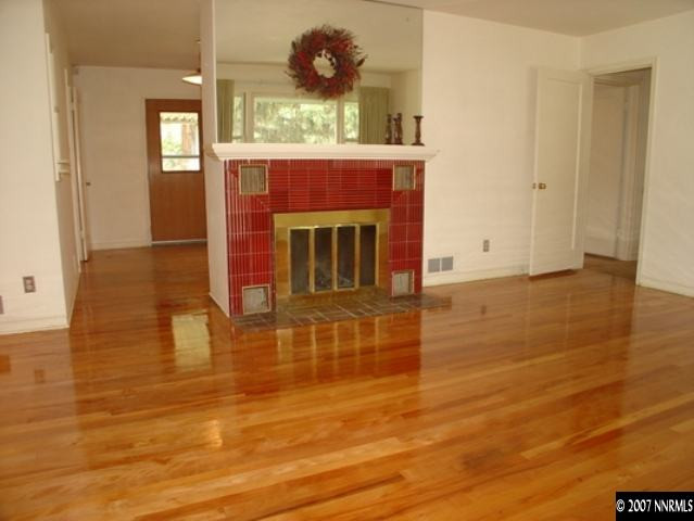 925 Whitaker Drive Reno, NV 89503 - Photo 2 of 9 a view of living room with furniture and fireplace