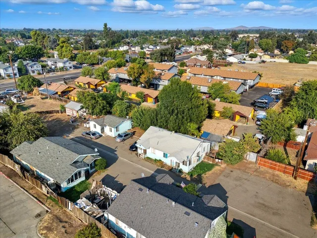 an aerial view of a house with a outdoor space
