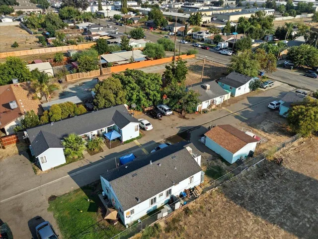 an aerial view of a house with a garden
