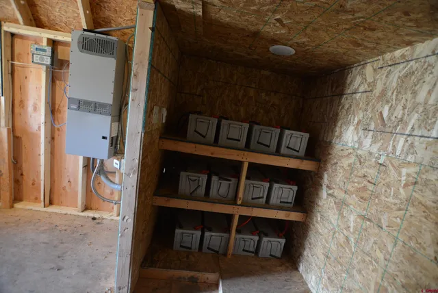 a view of a balcony with furniture