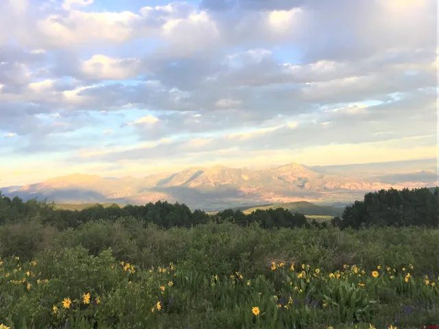 a view of a city and mountains