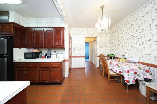 a kitchen with a sink and a stove