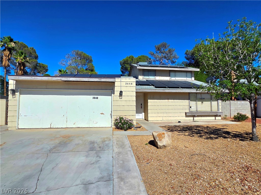 3648 Bronco Road Las Vegas, NV 89103 - Photo 1 of 24 Solar panels crown this charming residence, offering sustainable living.