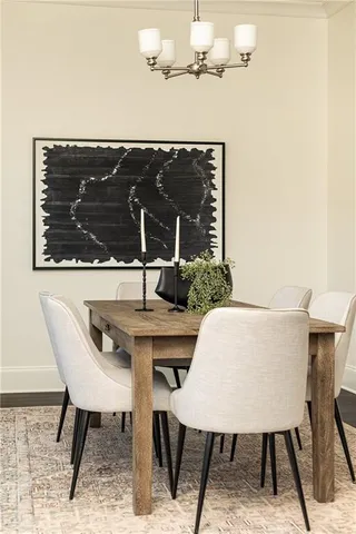 a view of a table and chairs in a patio