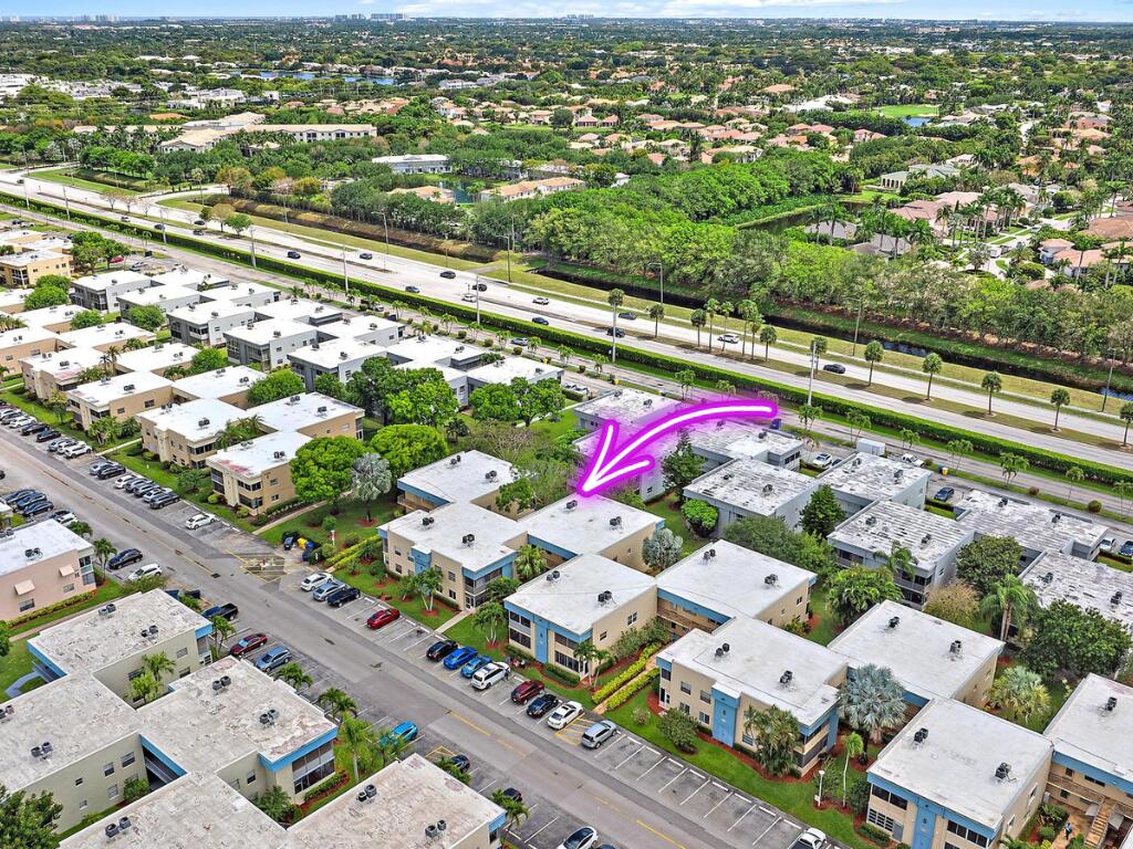869 Flanders South Delray Beach, FL 33484 - Photo 12 of 13 an aerial view of a city with lots of residential buildings