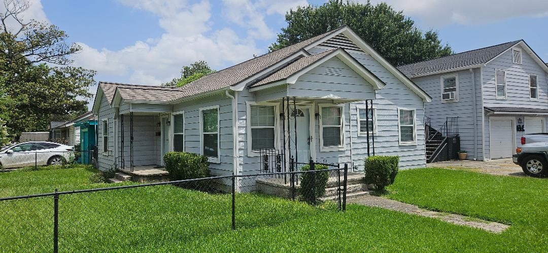 932 Walling Street Houston, TX 77009 - Photo 1 of 14 a view of a house with a yard and sitting area