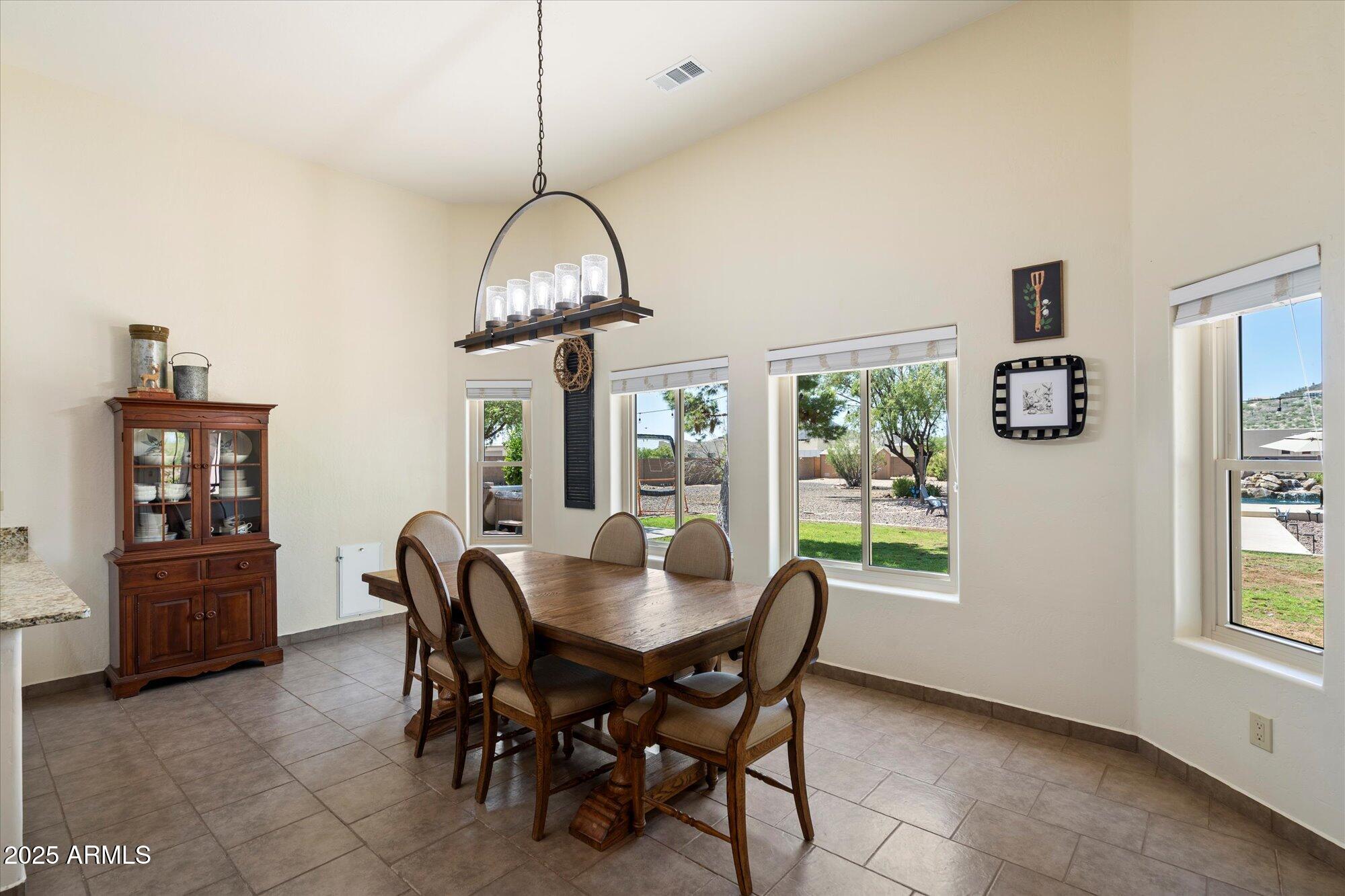 2815 West Irvine Road Phoenix, AZ 85086 - Photo 12 of 36 In Kitchen Dining