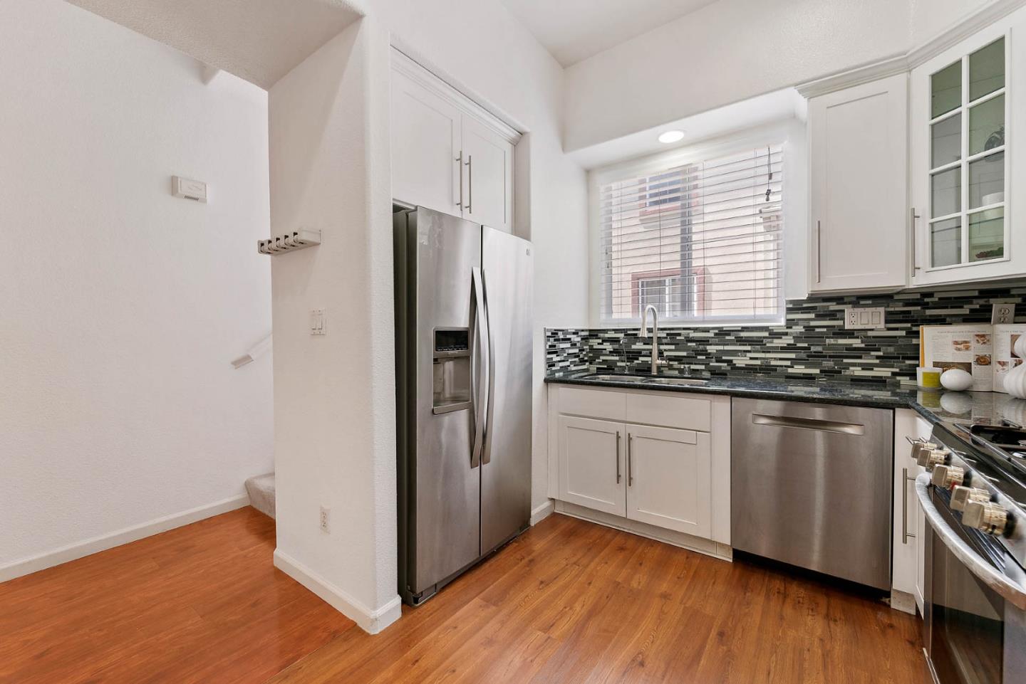 43 Rain Walk Milpitas, CA 95035 - Photo 12 of 48 a kitchen with stainless steel appliances a refrigerator and a stove