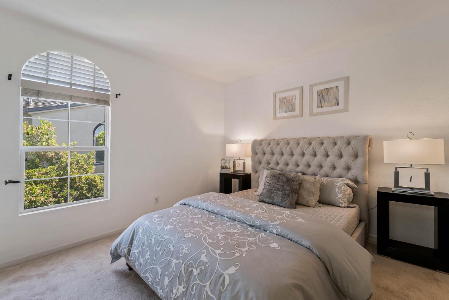 43 Rain Walk Milpitas, CA 95035 - Photo 16 of 48 a bedroom with a bed and a window