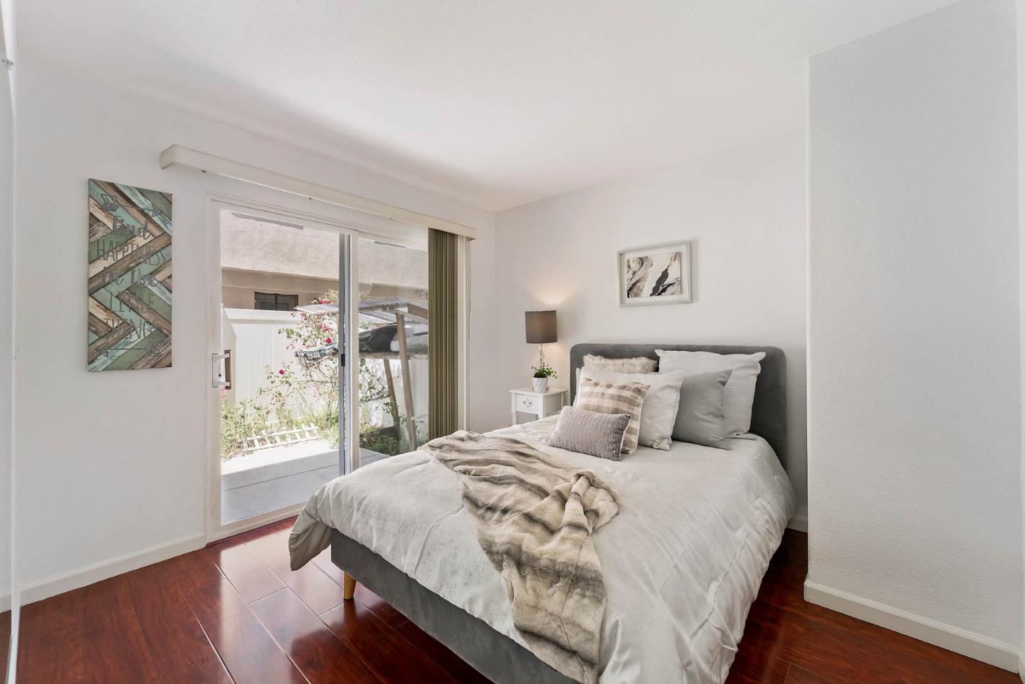 43 Rain Walk Milpitas, CA 95035 - Photo 23 of 48 a bedroom with a large bed and a window