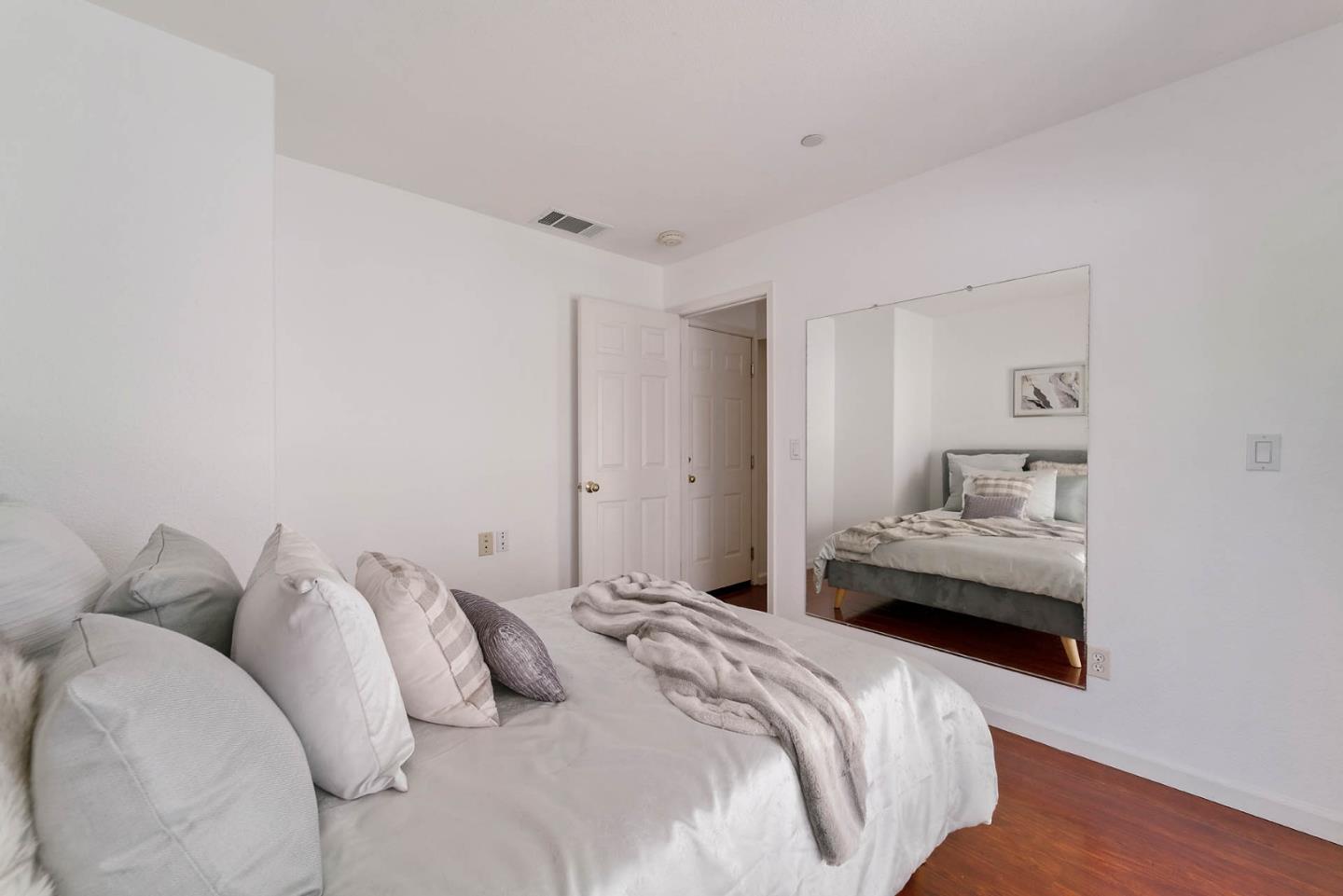 43 Rain Walk Milpitas, CA 95035 - Photo 24 of 48 a bedroom with a bed and a couch