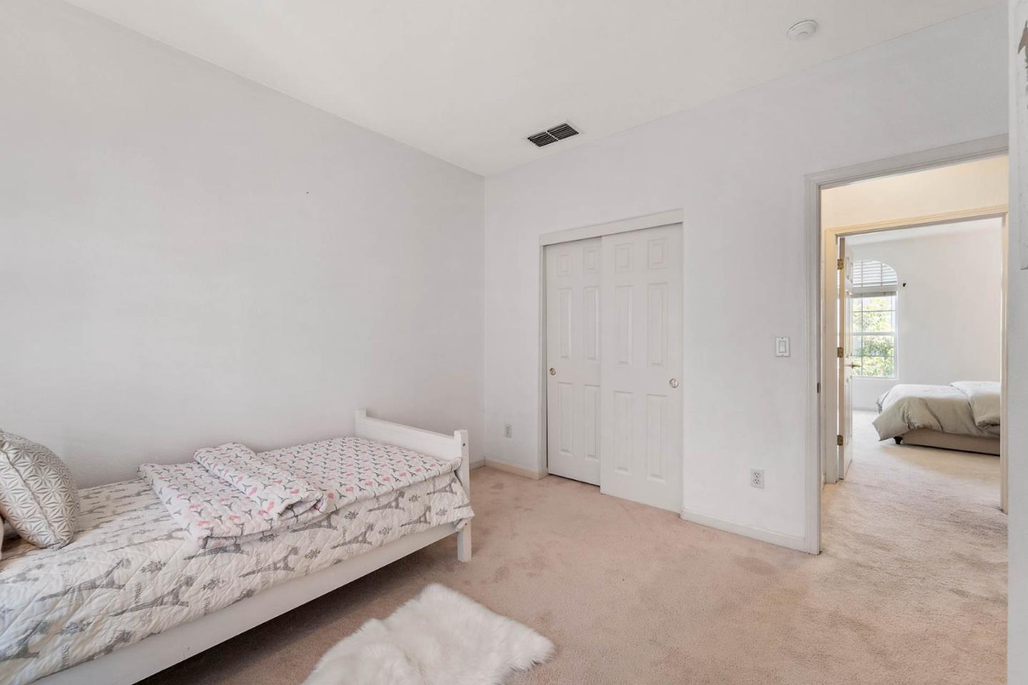 43 Rain Walk Milpitas, CA 95035 - Photo 29 of 48 a bedroom with a bed and a couch