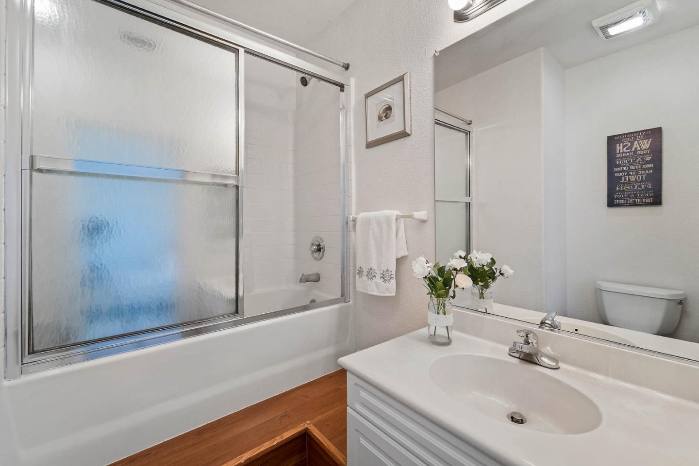 43 Rain Walk Milpitas, CA 95035 - Photo 30 of 48 a bathroom with a sink and a mirror