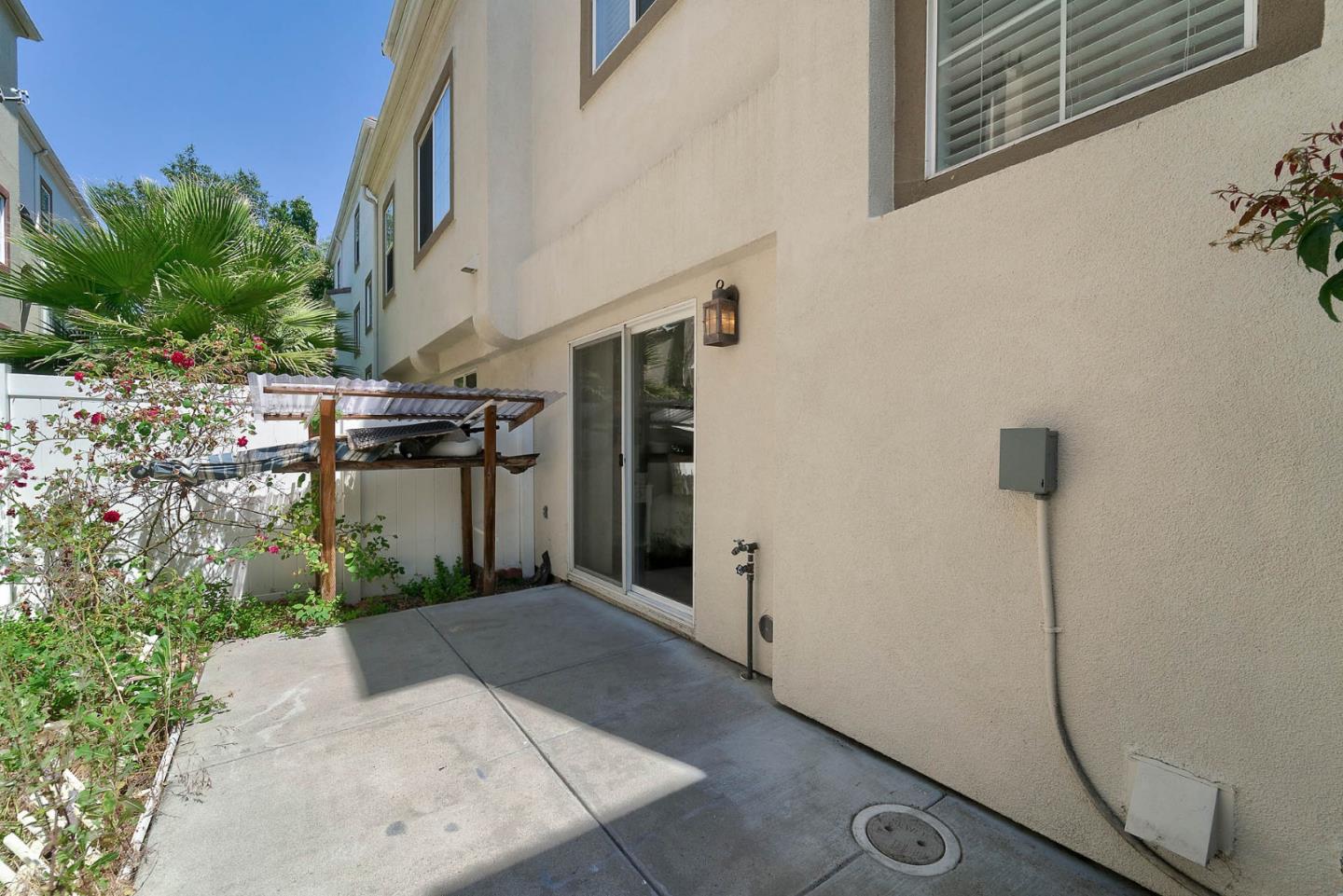 43 Rain Walk Milpitas, CA 95035 - Photo 35 of 48 a view of a path along with potted plants